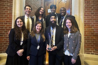 Model UN students posing for a group photo.