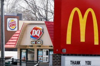 A Burger King, Dairy Queen, and McDonalds next to each other.