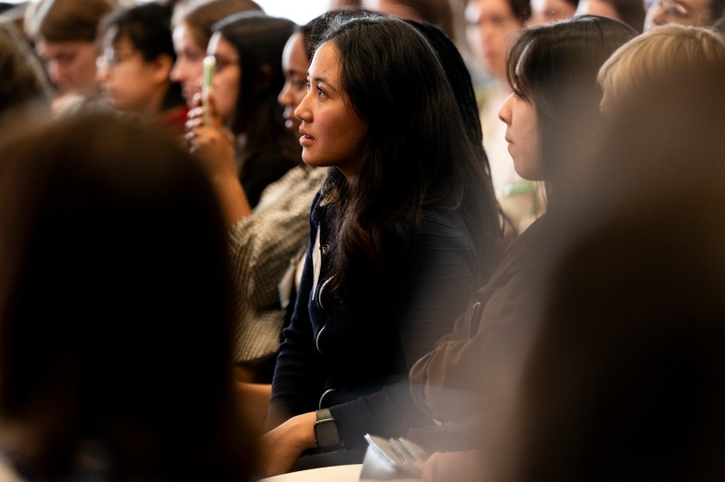 Audience members listening to Rima Abdul Malak.