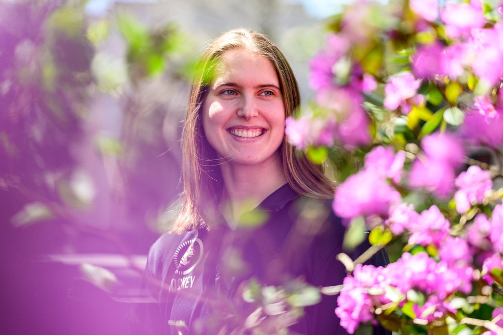 headshot of Megan Carter in the flowers