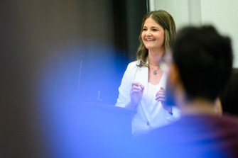 Daniele Mathras delivers last lecture in an ampitheater.