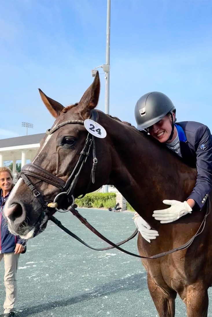 Fiona Howard hugging her horse.