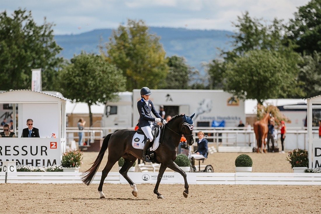 Fiona Howard riding dressage on her horse.