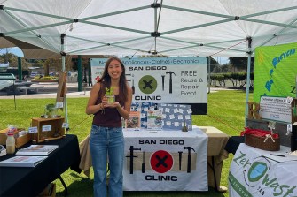 Nicole Lee posing at Zero Waste tent in San Diego.