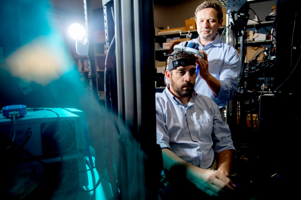 Gene Tunik and Matthew Yarossi conducting research.