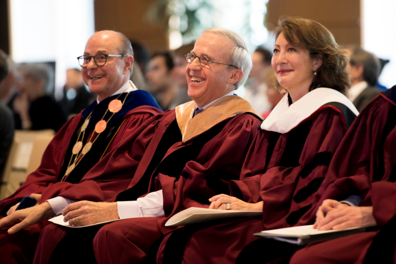 Henry Nasella sitting and laughing with Joseph Aoun sitting to his right and Diane Nishigaya MacGillivray sitting to his left.