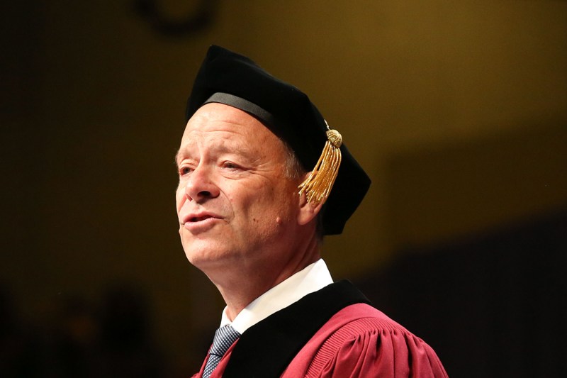 Chris Viehbacher speaking at the Bouve commencement ceremony.