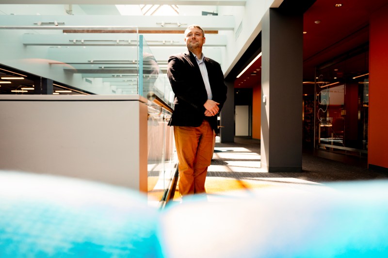 Khyle Hannan standing in Snell Library.