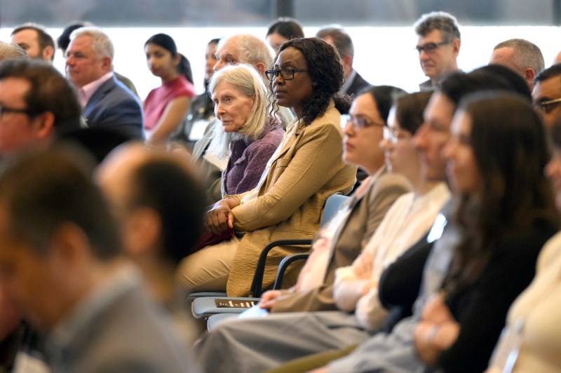 Audience members sitting at the Barnett Institute 50th Anniversary.