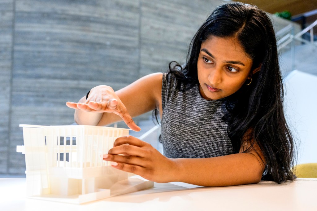 Rikita Iyer working on a 3D model for an architecture project.