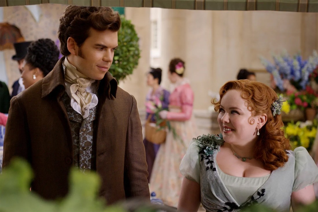 Screen capture of two characters from Bridgerton looking at each other and smiling.