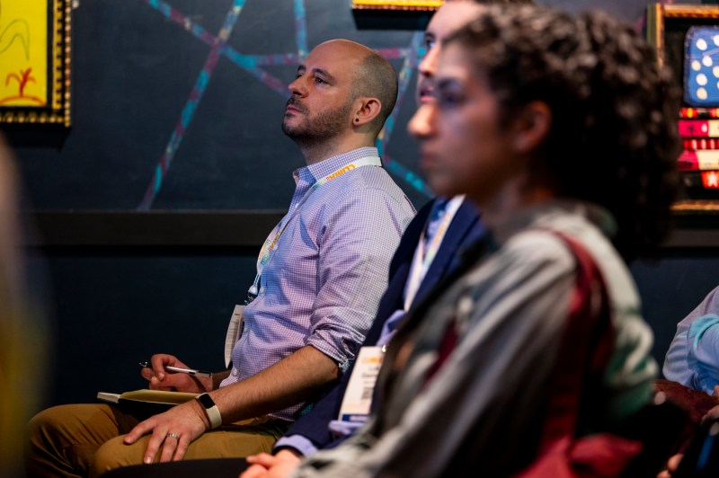 Audience members listening intently at the Climatech 2024 Conference