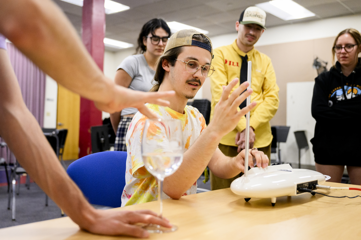 A student using historical musical technology.