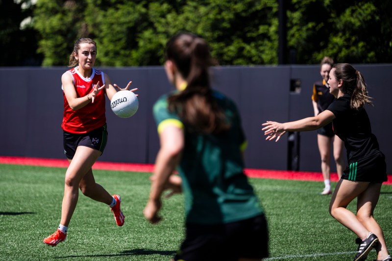 Queen's University Belfast women's gaelic football team practicing on Parsons Field.