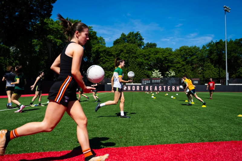 Queen's University Belfast women's gaelic football team practicing on Parsons Field.