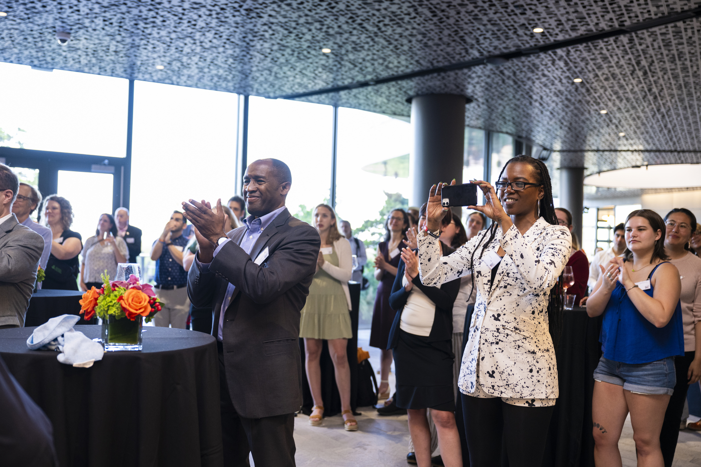 Audience members clapping at the CommUNITY Awards 2024.