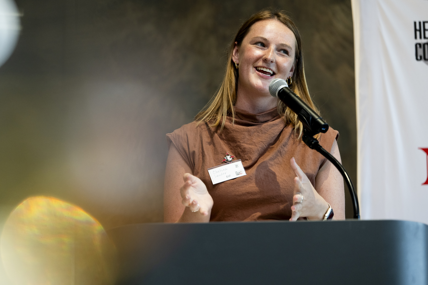 A person speaking at the CommUNITY Awards 2024.