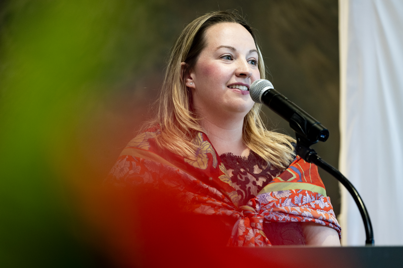 A person speaking at the CommUNITY Awards 2024.