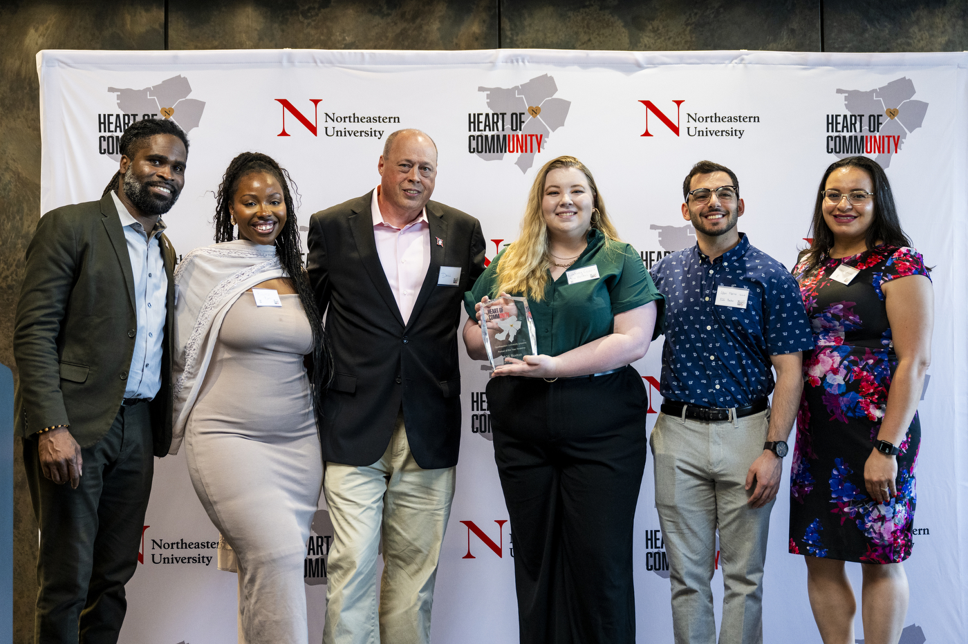 David Isberg posing with five other people at the CommUNITY Awards 2024.