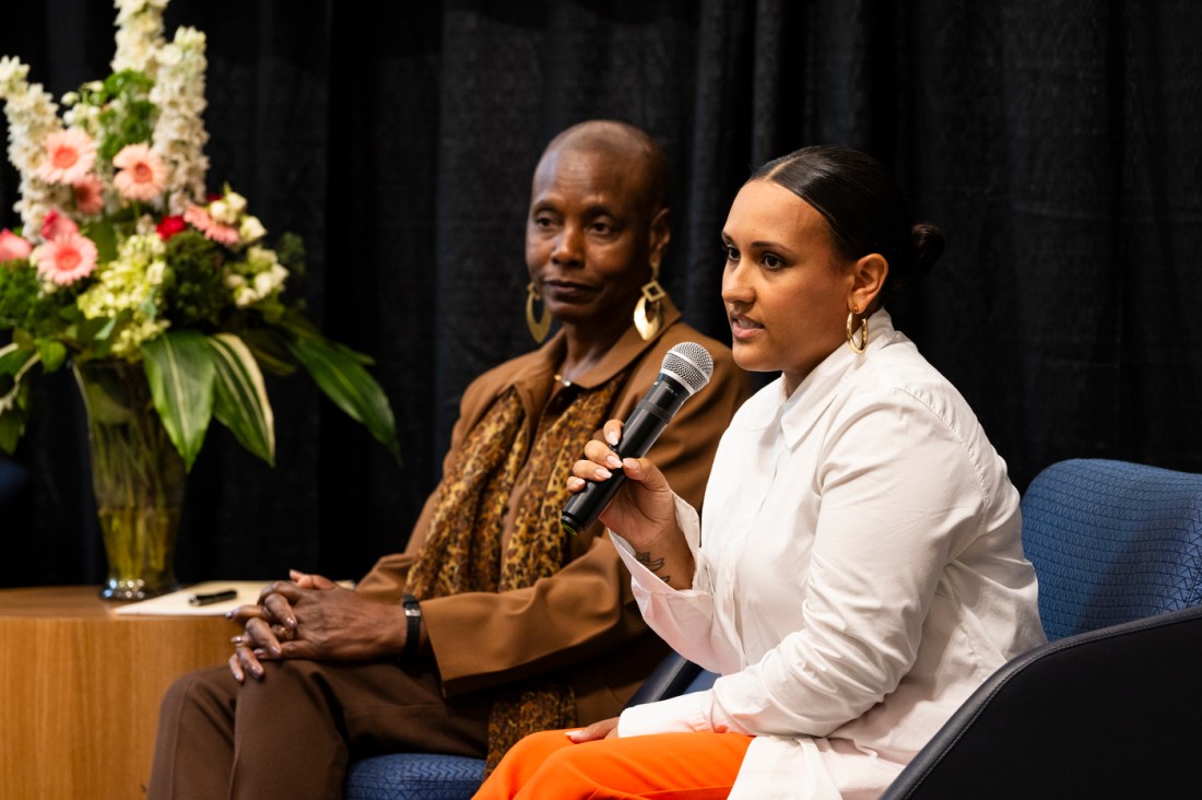 Two panelists sitting on stage at Northeastern's 2024 Juneteenth Celebration.