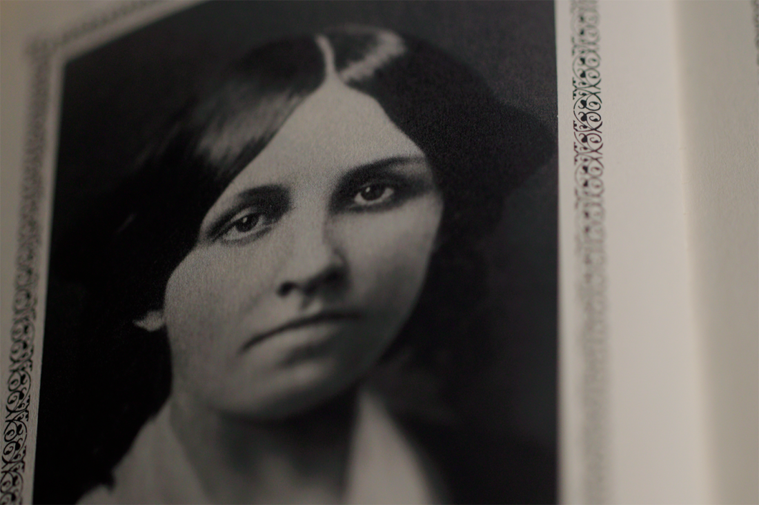 A black-and-white photograph of Louisa May Alcott