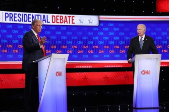 Former President Trump and President Biden stand in front of podiums in front of a bright blue, red background with red and blue text: "Presidential Debate."