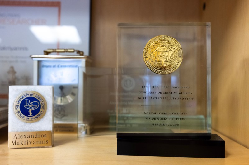 Alexandros Makriyannis' many awards are lined up on display. 