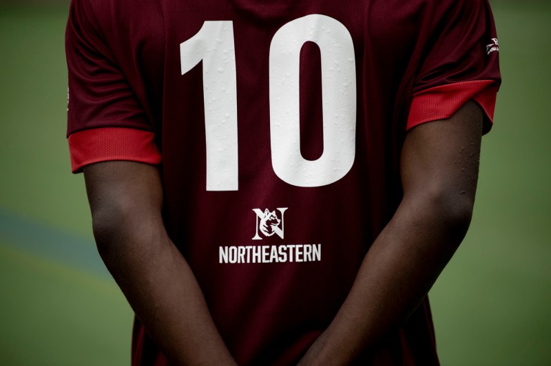 A person wearing a jersey with the number 10 on it.