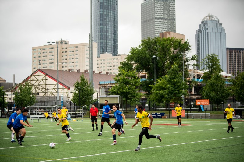 People playing soccer on Carter Field. 