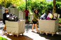 Students using wheeled bins to move onto the Boston campus.