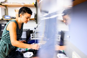 Gabriela Garcia working in a lab.