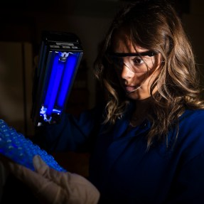 Kyla Drewry working in a lab.