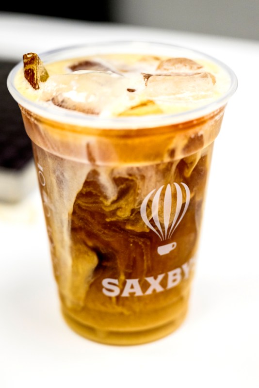 An iced coffee with milk in it.