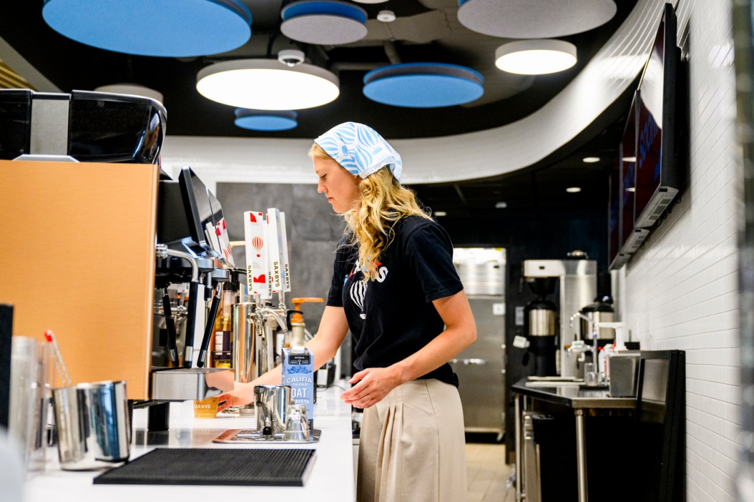 A student working at the Saxby's cafe. 