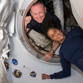 Boeing astronauts pose inside the Starlinger spacecraft in June.