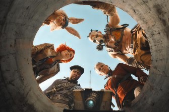 A screen capture from the 'Borderlands' movie of the characters all looking down into a hole at the camera.