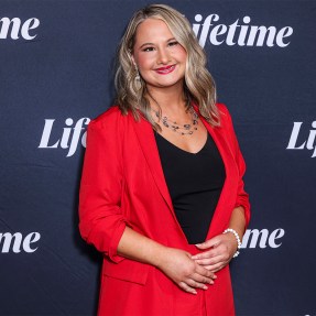 Gypsy Rose Blanchard wearing a red blazer and black shirt at a Lifetime event.