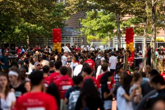 A crowd returning to campus