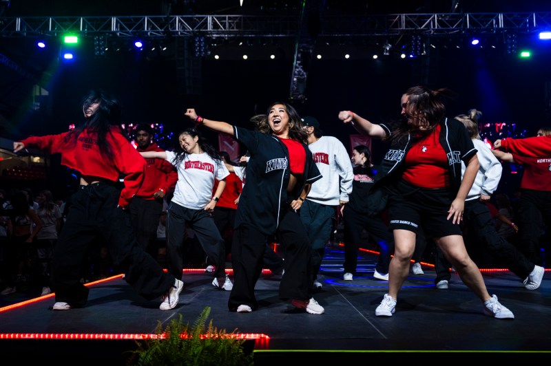 A dance group performing on stage at Convocation.