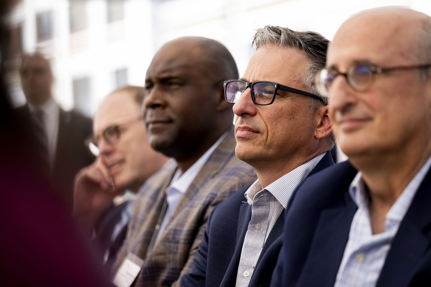 Audience members listening intently at the Portland ground breaking. 