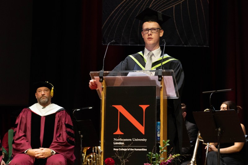 A graduate speaking at the London graduation.