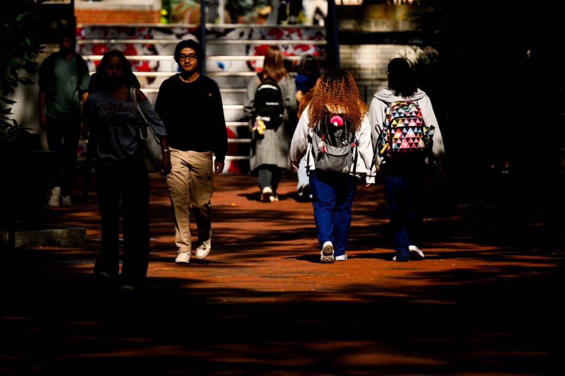 A students walking towards the ISEC building.