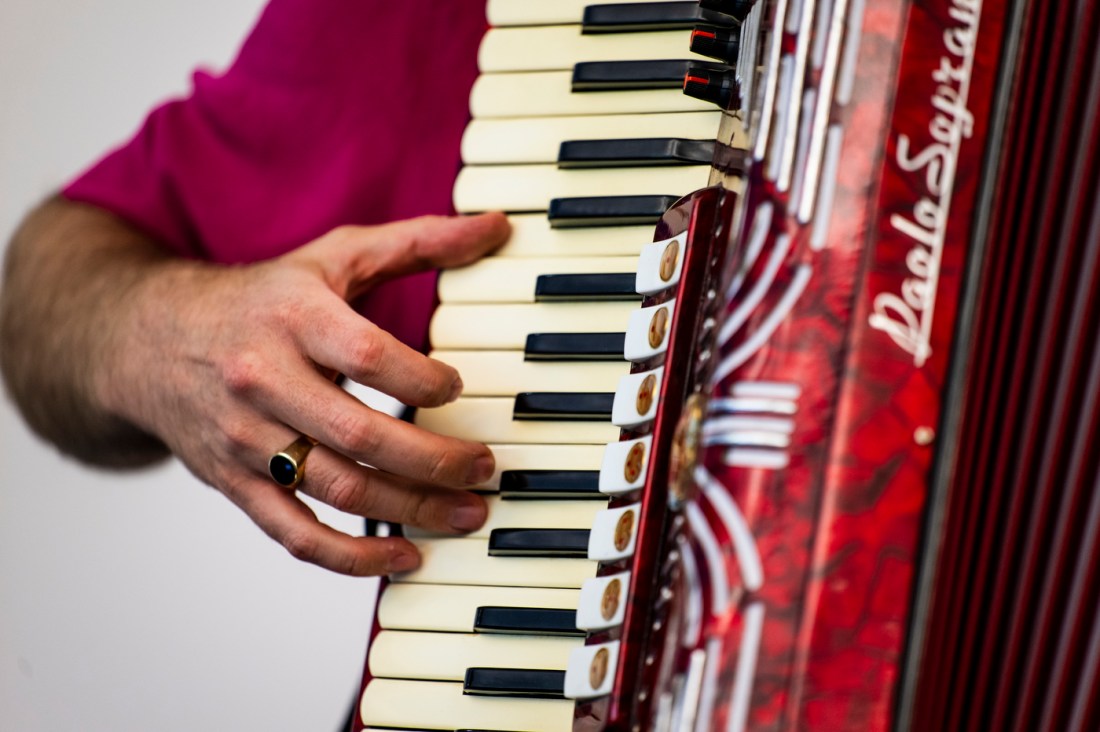 Neta Weiner playing the accordian.