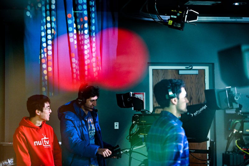 Adam Viazanko, David Habboosh, and Jonas Fryer in the NUTV recording studio.