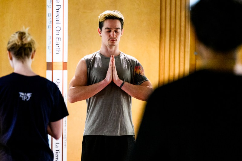 People doing yoga in Ell Hall.