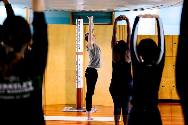 People doing yoga in Ell Hall.