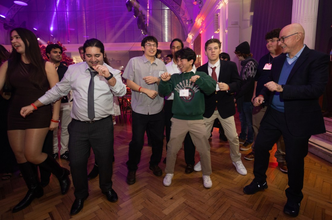 President Aoun joins students on the dance floor during Northeastern’s Thanksgiving dinner in London.