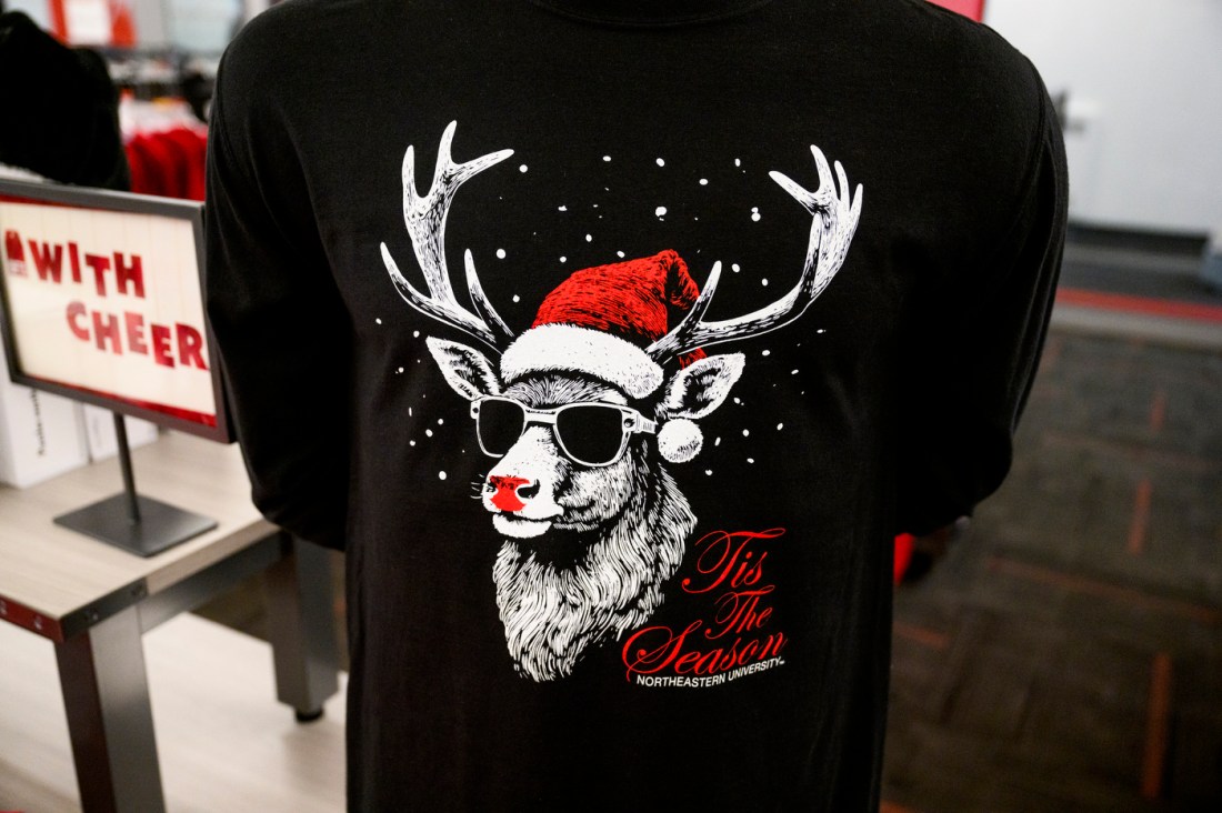 A Northeastern branded 'Tis the Season' shirt.