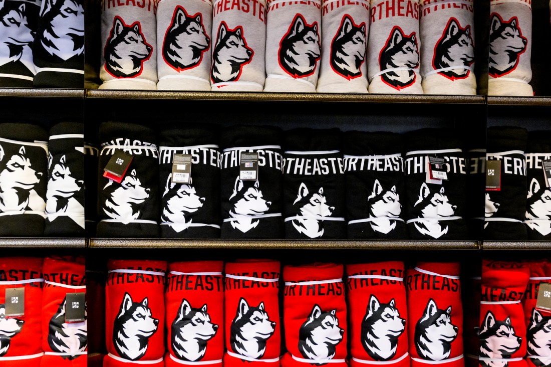 Northeastern branded blankets, rolled up.