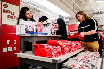 People shopping at the Northeastern bookstore.